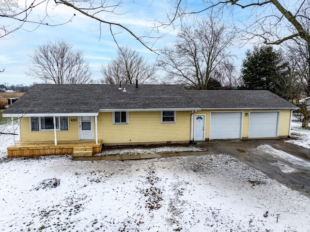 single story home with a garage