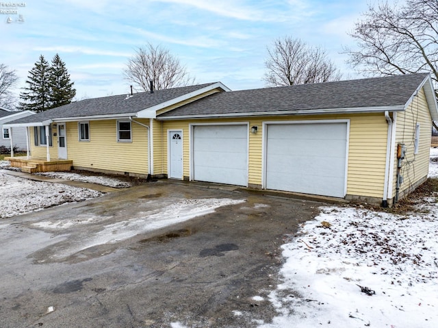 ranch-style house with a garage