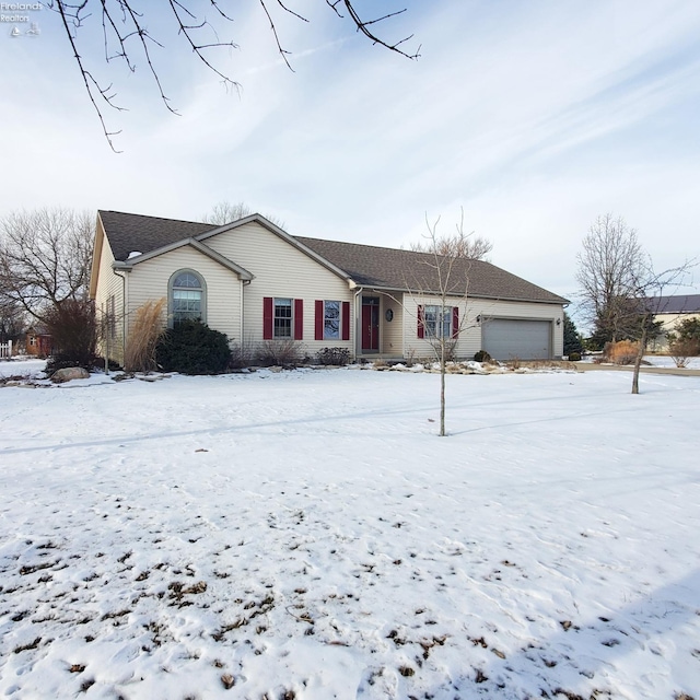 single story home featuring a garage