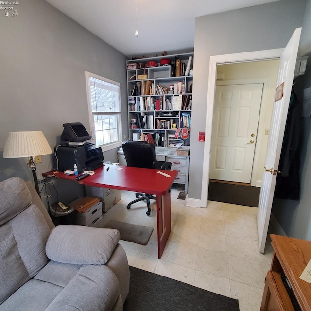 office space featuring light tile patterned floors