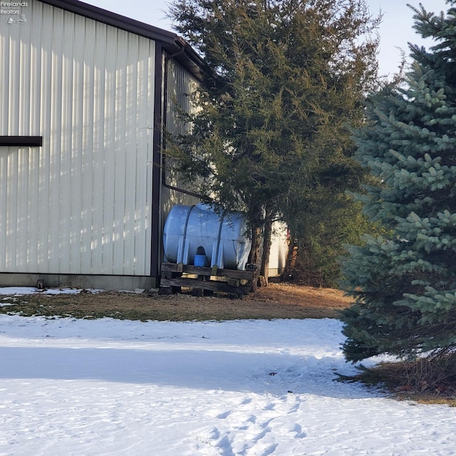 view of snow covered property