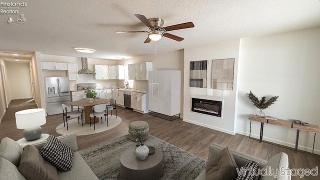 living room featuring ceiling fan, dark hardwood / wood-style floors, and a textured ceiling