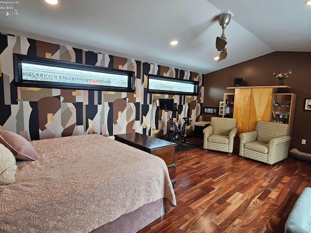 bedroom featuring wood-type flooring and lofted ceiling