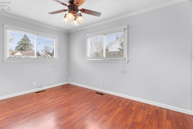 unfurnished room featuring crown molding, ceiling fan, and wood-type flooring