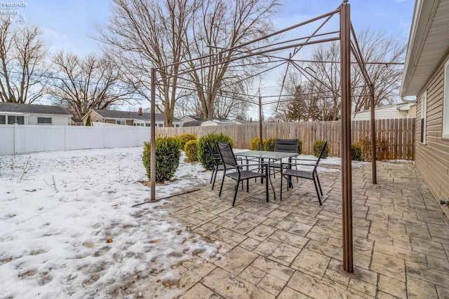 view of snow covered patio