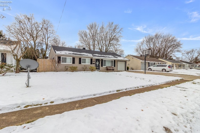 single story home featuring a garage