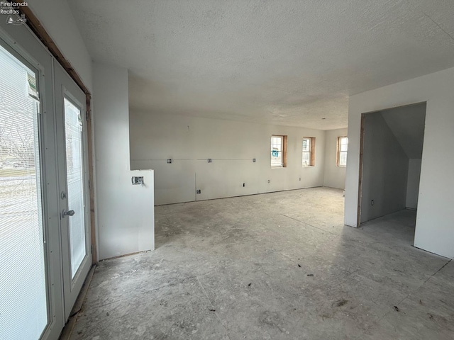 interior space featuring a textured ceiling