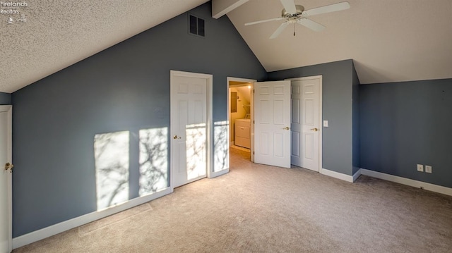 bonus room featuring lofted ceiling with beams, light carpet, a textured ceiling, and ceiling fan