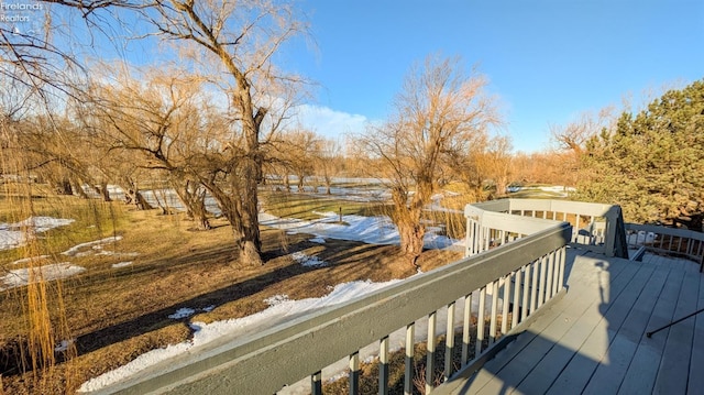 view of snow covered deck