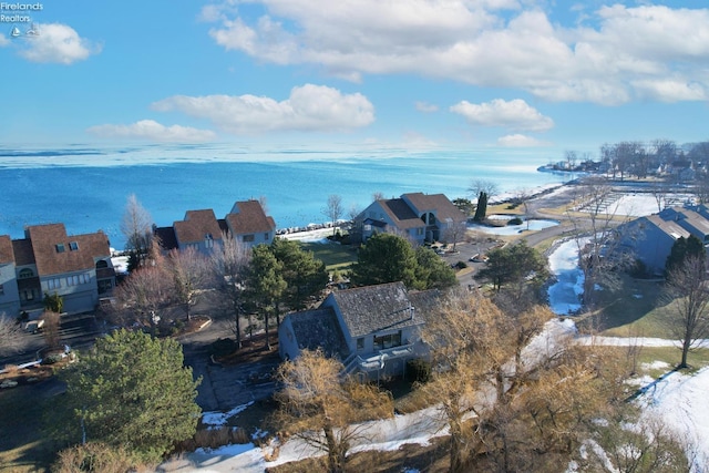 drone / aerial view with a water view