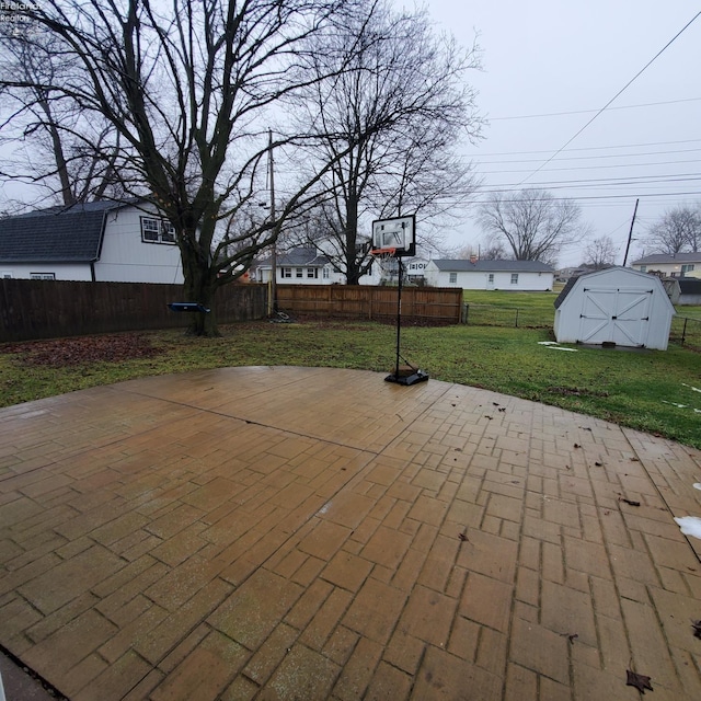 view of patio / terrace with a storage unit