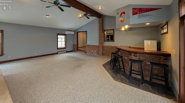 bar featuring dark colored carpet, an AC wall unit, beamed ceiling, ceiling fan, and a fireplace