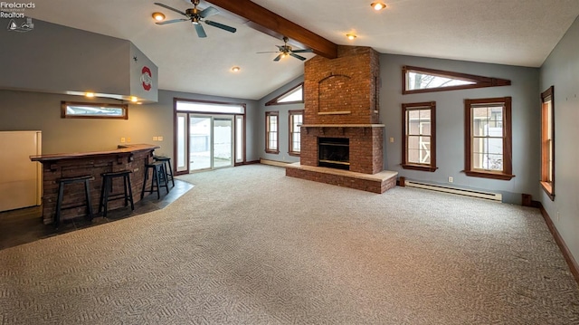 unfurnished living room with a baseboard heating unit, vaulted ceiling with beams, a brick fireplace, dark carpet, and indoor bar