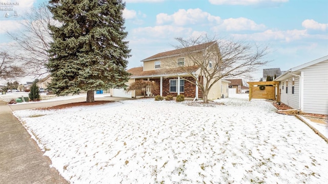 view of snow covered property