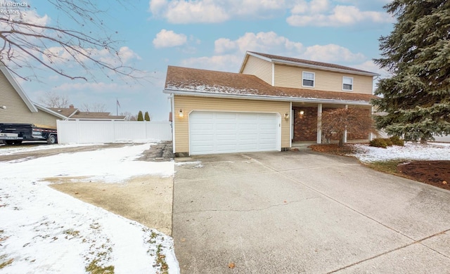 view of front of property featuring a garage