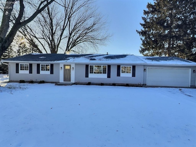 single story home with a garage