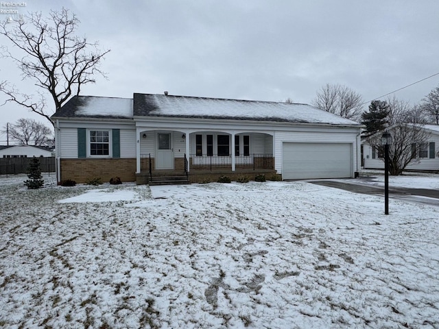 ranch-style house featuring a garage