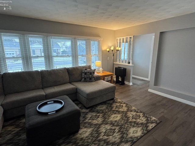 living room featuring dark hardwood / wood-style floors