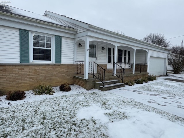 single story home with a garage