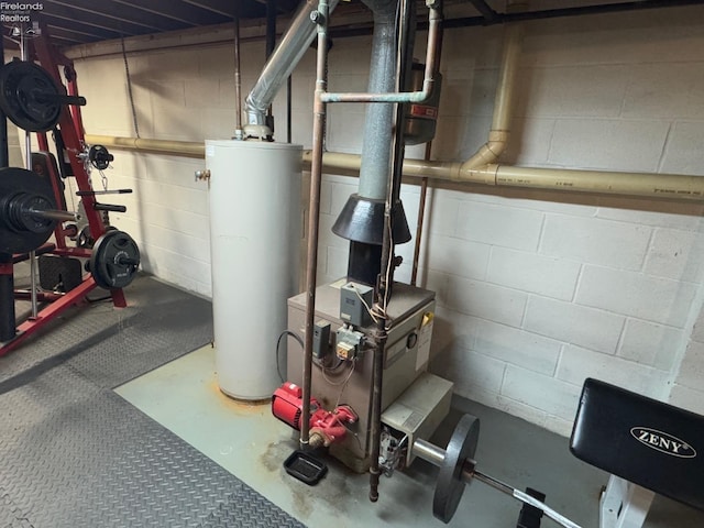 utility room with water heater