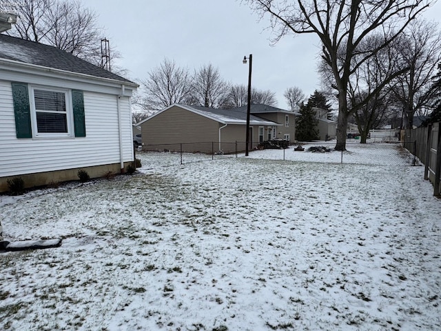 view of yard covered in snow