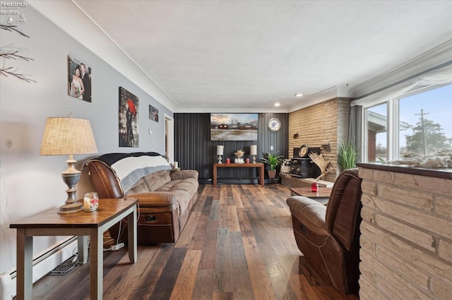 living room featuring hardwood / wood-style flooring and a baseboard radiator