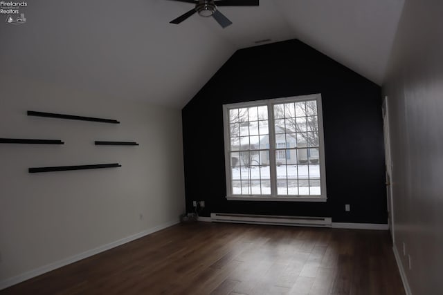 unfurnished room featuring lofted ceiling, a baseboard radiator, dark hardwood / wood-style floors, and ceiling fan