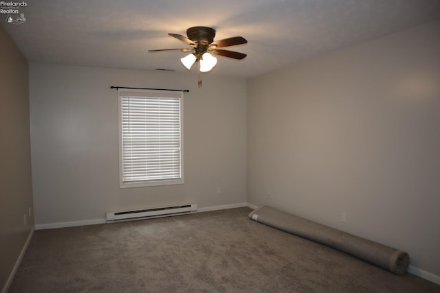 spare room featuring a baseboard radiator, carpet flooring, and ceiling fan