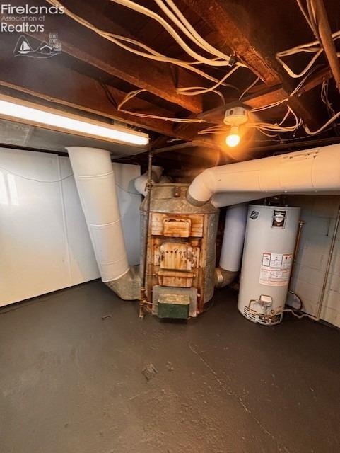 basement featuring gas water heater