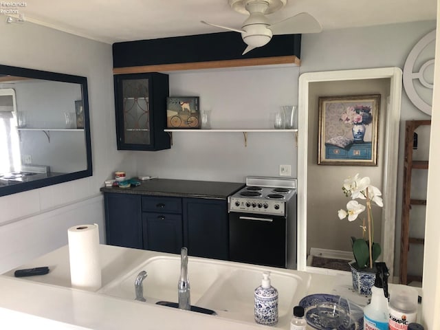 kitchen with electric range and ceiling fan