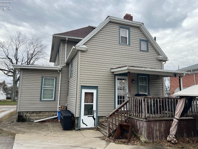 rear view of house with a patio area