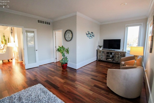 living room with dark wood-type flooring and ornamental molding