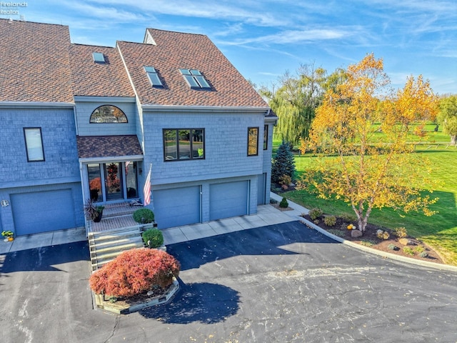 view of front of home featuring a garage