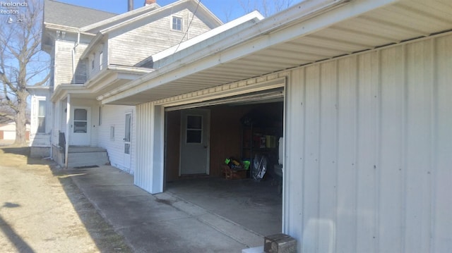 property entrance with a garage