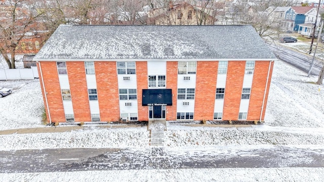 view of snow covered property