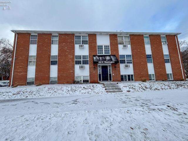 view of snow covered building