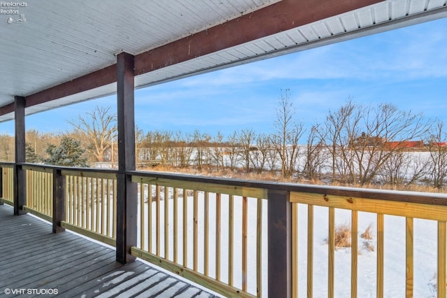 view of snow covered deck