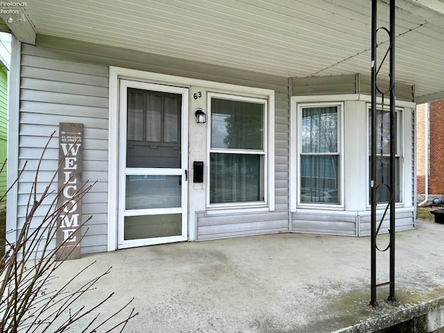 entrance to property with a patio area