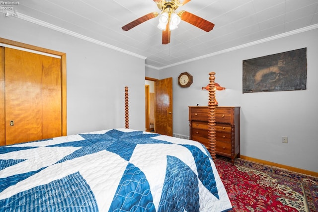 bedroom featuring ornamental molding and ceiling fan