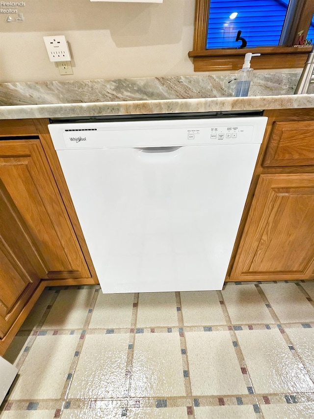 interior details featuring white dishwasher