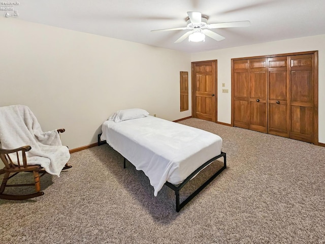 bedroom with ceiling fan and carpet