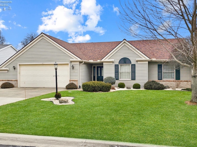 single story home featuring a garage and a front lawn