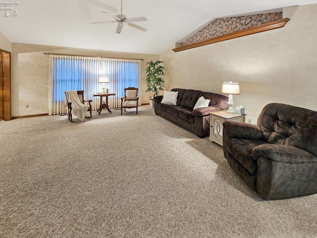 living room with lofted ceiling, carpet flooring, and ceiling fan