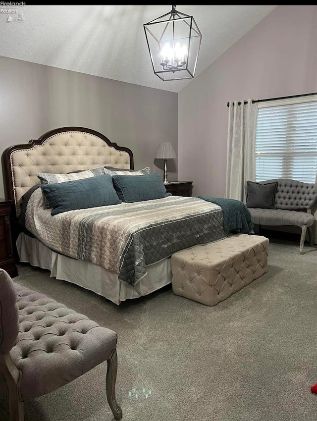 carpeted bedroom featuring vaulted ceiling and a notable chandelier