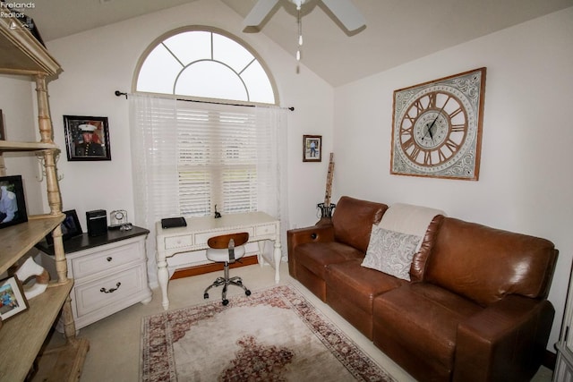 home office with light carpet, vaulted ceiling, and ceiling fan