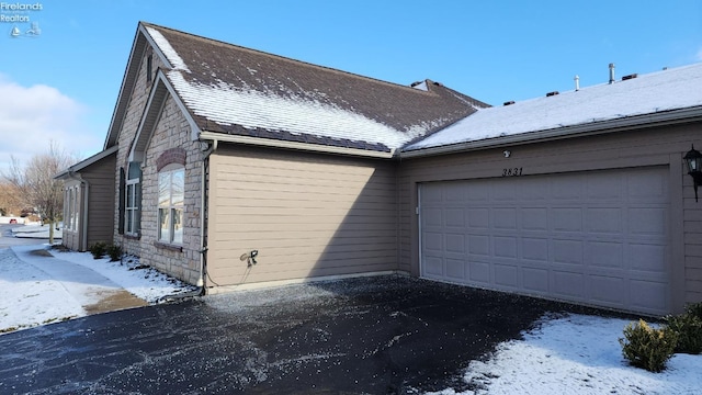 exterior space featuring a garage