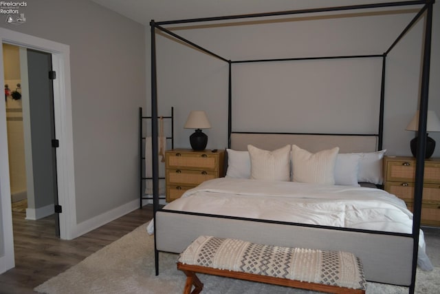 bedroom featuring hardwood / wood-style floors