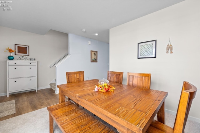 dining room featuring wood-type flooring