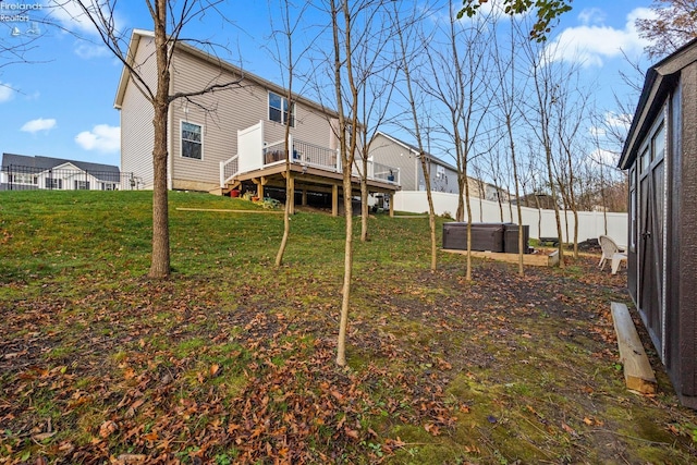 view of yard with a wooden deck