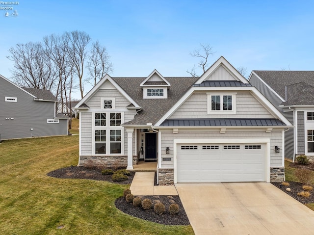 craftsman-style house with a garage and a front yard